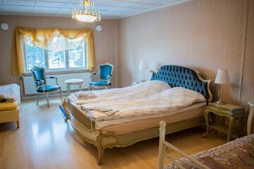 Фото номера Четырехместный номер с общей ванной комнатой Отель Saarijärven Ruustinna Oy г. Saarijärvi 5